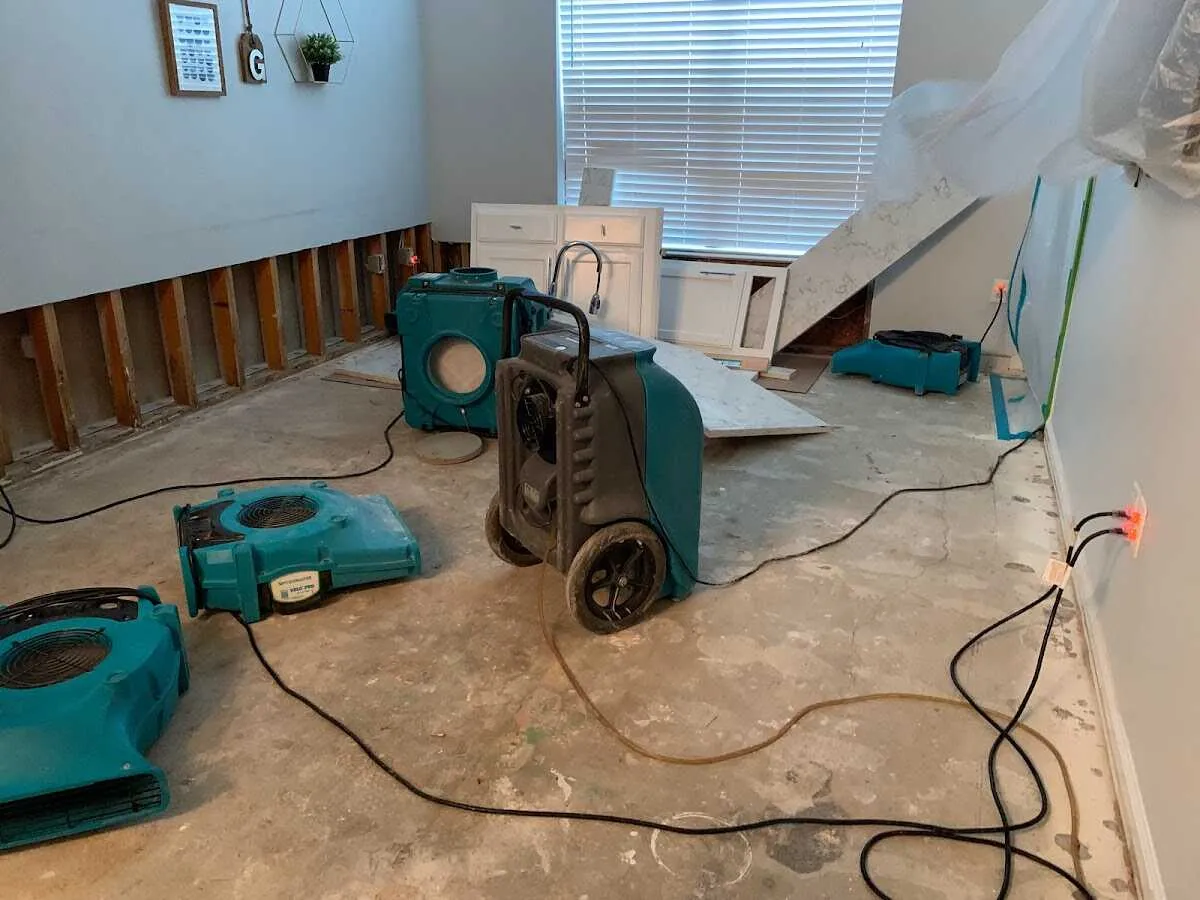 Dehumidifier in flood-cut room for Water Damage Restoration in Riverview